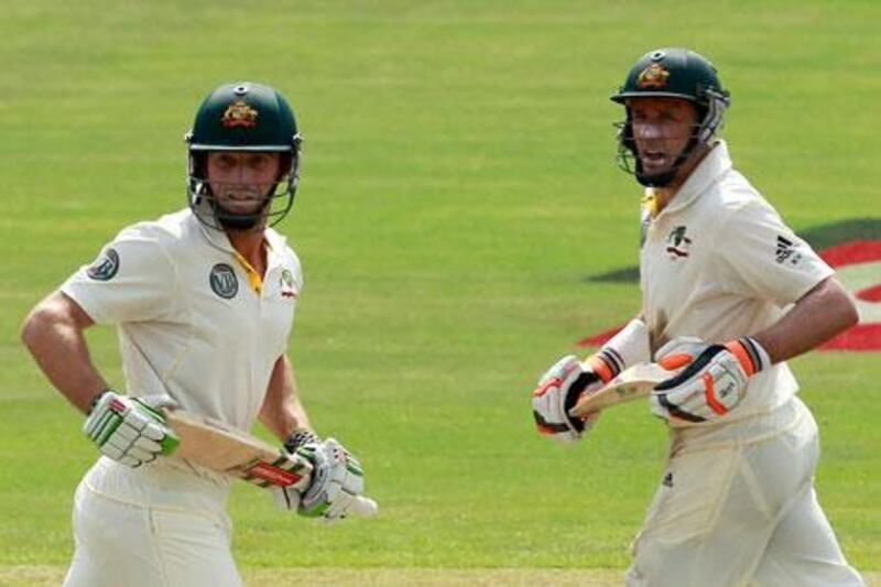Shaun Marsh, left, and Michael Hussey run between the wickets on the second day of the second Test.