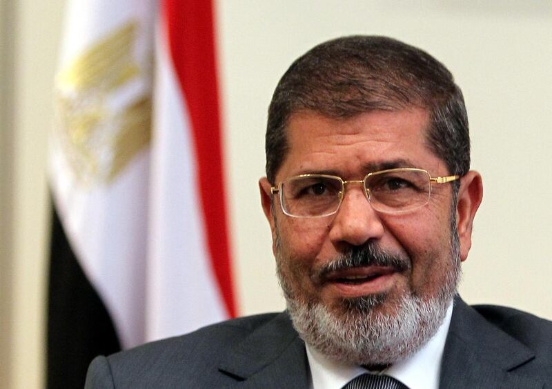 epa07654288 (FILE) - Egyptian President Mohamed Morsi during a meeting in Cairo, Egypt, 08 July 2012 (reissued 17 June 2019). Reports state Morsi died on 17 June 2019 during a trial session in an espionage case.  EPA/KHALED ELFIQI *** Local Caption *** 51087549