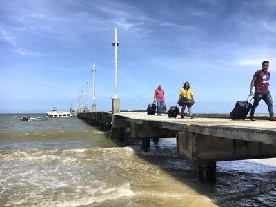 Venezuelan refugees arriving in Cedros, Trinidad. Colin Freeman for The National