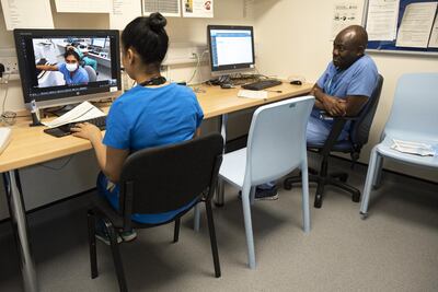 Doctors are able to help monitor patients remotely, using the headset's video link. Courtesy Microsoft