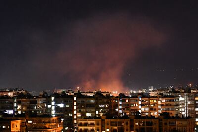 Smoke billows following an Israeli air strike targeting south of Damascus, Syria, in July. AFP