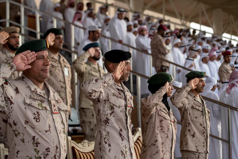 Maj Gen Pilot Sheikh Ahmed bin Tahnoon, Chairman of the National and Reserve Service Authority (2nd L), attends the summer course graduation ceremony at Sieh Al Hama military camp. Rashed Al Mansoori / Crown Prince Court - Abu Dhabi