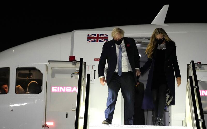 Britain's Prime Minister Boris Johnson and his wife Carrie arrive in Rome. AP