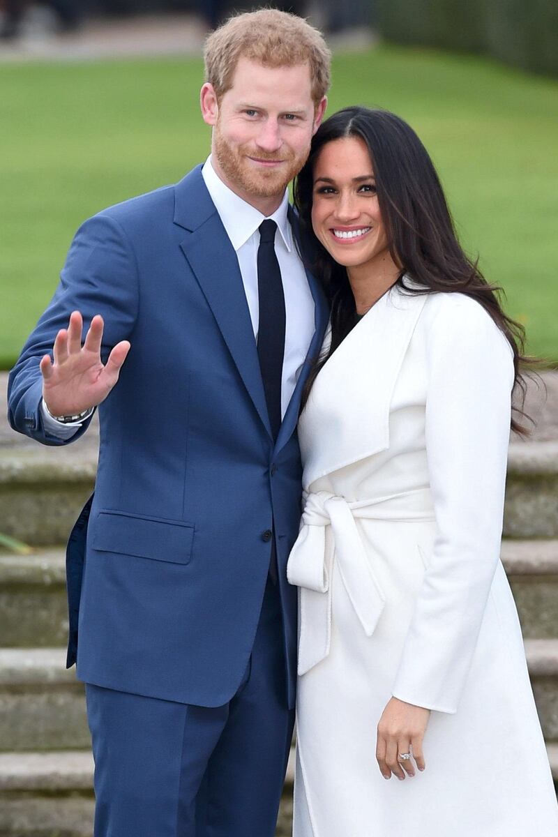 LONDON, ENGLAND - NOVEMBER 27:  Prince Harry and actress Meghan Markle during an official photocall to announce their engagement at The Sunken Gardens at Kensington Palace on November 27, 2017 in London, England.  Prince Harry and Meghan Markle have been a couple officially since November 2016 and are due to marry in Spring 2018.  (Photo by Eddie Mulholland-WPA Pool/Getty Images)