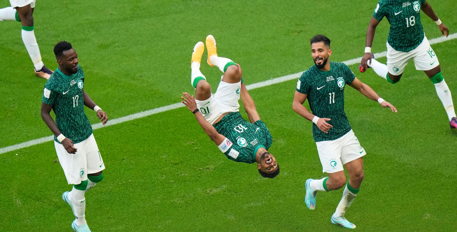 Saudi Arabia's Salem Al-Dawsari, second left, celebrates after scoring his side's second goal during the World Cup group C soccer match between Argentina and Saudi Arabia at the Lusail Stadium in Lusail, Qatar, Tuesday, Nov.  22, 2022.  (AP Photo / Luca Bruno)