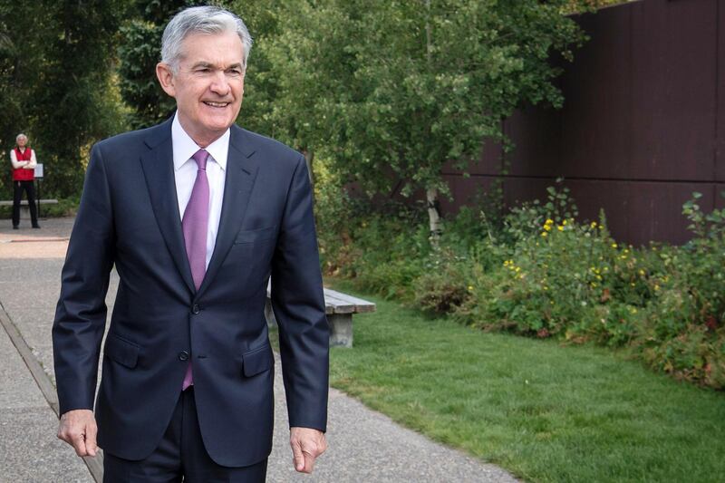 Jerome Powell, chairman of the U.S. Federal Reserve, walks the grounds during the Jackson Hole economic symposium, sponsored by the Federal Reserve Bank of Kansas City, in Moran, Wyoming, U.S., on Friday, Aug. 24, 2018. While Powell said U.S. productivity has been low for a decade or longer, his comments suggest he would want to accommodate with low interest rates any rise in efficiency across the American economy. Photographer: David Paul Morris/Bloomberg