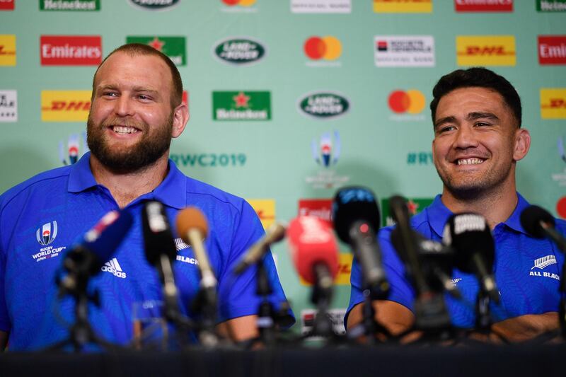 New Zealand's prop Joe Moody (L) shares a laugh with New Zealand's hooker Codie Taylor  as they deliver a press conference in Beppu on September 27, 2019, during the Japan 2019 Rugby World Cup.   / AFP / Christophe SIMON
