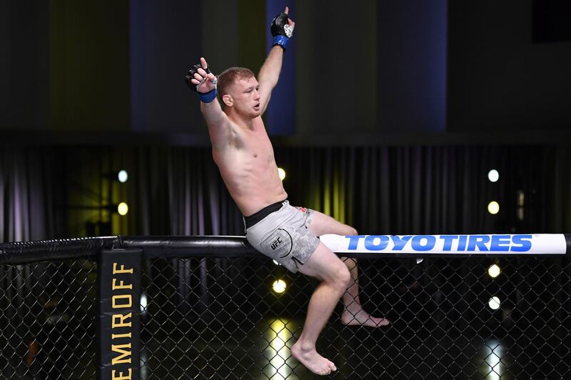 Casey Kenney celebrates after his submission victory over Louis Smolka. Zuffa