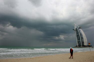 Dark clouds form above the beach near Burj Al Arab in Dubai. Stephen Lock / The National