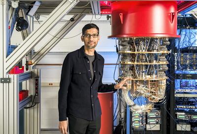 This undated handout image obtained October 23, 2019 courtesy of Google shows Sundar Pichai with one of Google's quantum computers in the Santa Barbara lab. - Scientists claimed on October 23, 2019 to have achieved a near-mythical state of computing in which a new generation of machine vastly outperforms the world's fastest super-computer, known as "quantum supremacy". A team of experts working on Google's Sycamore machine said their quantum system had executed a calculation in 200 seconds that would have taken a classic computer 10,000 years to complete.In a study published in Nature, the international team designed the Sycamore quantum processer, made up of 54 qubits interconnected in a lattice pattern. They used the machine to perform a task related to random-number generation, identifying patterns amid seemingly random spools of figures.The Sycamore, just a few millimetres across, solved the task within 200 seconds, a process that on a regular machine would take 10,000 years -- several hundreds of millions of times faster, in other words. Google's CEO Sundar Pichai hailed the result as a sea change in computing. (Photo by HO / GOOGLE / AFP) / RESTRICTED TO EDITORIAL USE - MANDATORY CREDIT "AFP PHOTO / GOOGLE/HANDOUT" - NO MARKETING - NO ADVERTISING CAMPAIGNS - DISTRIBUTED AS A SERVICE TO CLIENTS