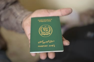 The Dubai resident's employer says the passport cannot be returned as his visa is in process. Photo: AFP
