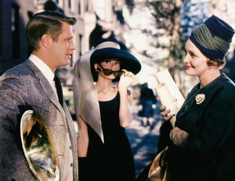 George Peppard, left, Audrey Hepburn, centre and Patricia Neal, in Breakfast at Tiffany’s.This property was Hepburn’s iconic character Holly Golightly’s home in the film. AP Photo / Paramount Pictures