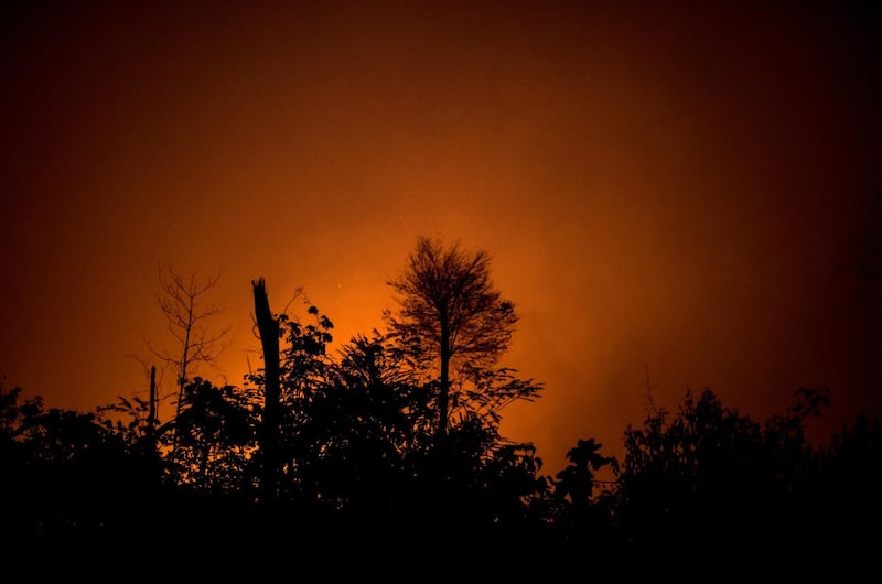 Fire burns in the Amazon rainforest in Porto Velho, Rondonia state, Brazil, on Saturday, Aug. 24, 2019. The world's largest rainforest, Brazil's Amazon, is burning at a record rate, according to data from the National Institute of Space Research that intensified domestic and international scrutiny of President Jair Bolsonaro's environmental policies. Photographer: Leonardo Carrato/Bloomberg