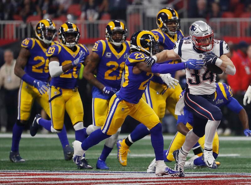 The Patriots' Rex Burkhead in action with Los Angeles Rams' Nickell Robey-Coleman. Reuters