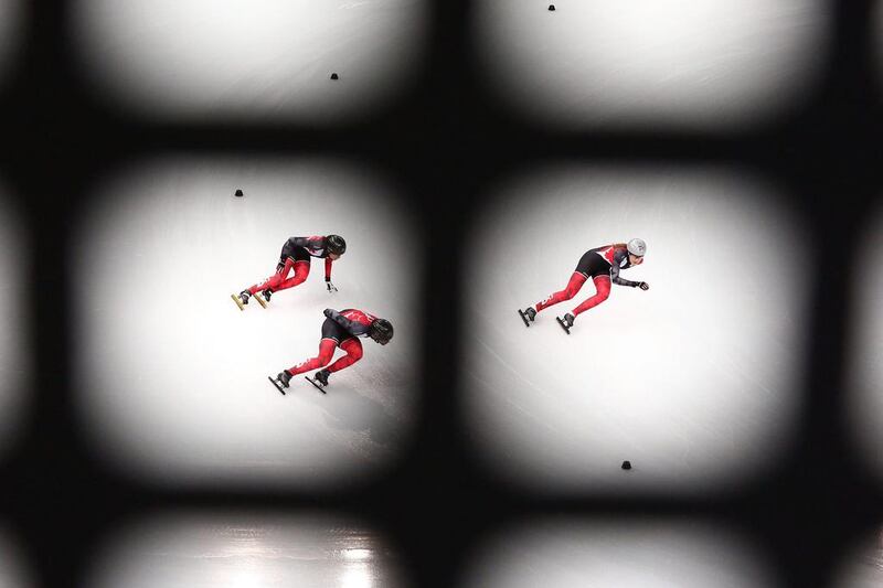 Members of the Canada short track speed skating team practice at Iceberg Skating Palace on Sunday.  Quinn Rooney / Getty Images