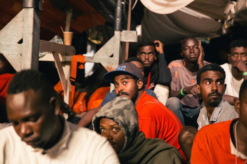 epa06838213 A handout photo made available by German NGO 'Mission Lifeline' on 25 June 2018 shows migrants aboard the NGO's rescue vessel 'Lifeline' in the Mediterranean, 25 June 2018. Members of the German parliament Bundestag on 25 June reported from their visit to the ship saying they witnessed a 'catastrophic' situation. Both Italy and Malta deny the ship an entry to one of their country's ports.  EPA/Felix Weiss / HANDOUT  HANDOUT EDITORIAL USE ONLY/NO SALES