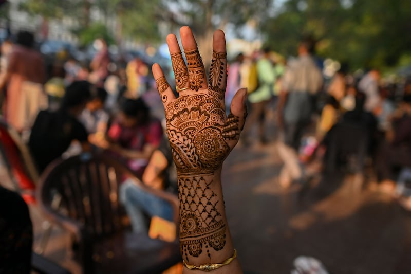 A hand decorated with henna on the eve of the Karva Chauth festival in New Delhi.  AFP