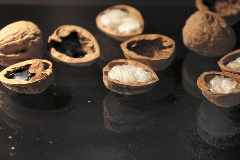 Dubai, United Arab Emirates - July 07, 2019: Drugs are hidden in walnuts at the exhibition of seizures at Dubai Airport. Sunday the 7th of July 2019. DXB, Dubai. Chris Whiteoak / The National