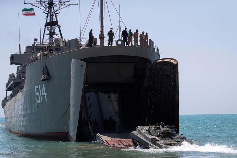 An Iranian tank exiting from a navy warship during a military exercise in the Gulf, near the strategic strait of Hormuz in southern Iran during a drill.  AFP, HO via Iranian Army website