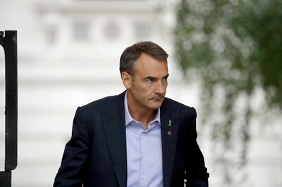 Bernard Looney the CEO of oil and gas company BP walks to go into 10 Downing Street in London, Friday, Sept. 11, 2020. (AP Photo/Matt Dunham)