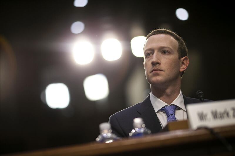 Mark Zuckerberg, chief executive officer and founder of Facebook Inc., listens during a joint hearing of the Senate Judiciary and Commerce Committees in Washington, D.C., U.S., on Tuesday, April 10, 2018. Zuckerberg apologized, defended his company, and jousted with questioners while agreeing with others during his first-ever congressional testimony. Early reviews on his effort to restore trust with lawmakers and the public were mostly positive. Photographer: Al Drago/Bloomberg