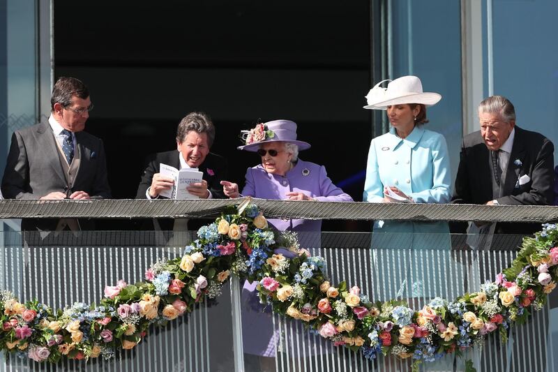 Godolphin celebrated their first win in the Epsom Derby as William Buick rode Masar to victory, much to the delight of Sheikh Mohammed bin Rashid, Vice President of the UAE and Ruler of Dubai, and Sheikh Hamdan bin Mohammed, Crown Prince of Dubai.  Daniel Leal-Olivas / AFP