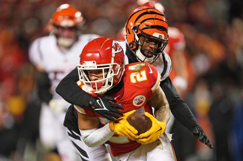 Kansas City Chiefs wide receiver Skyy Moore runs with the ball against Cincinnati Bengals cornerback Eli Apple. Reuters
