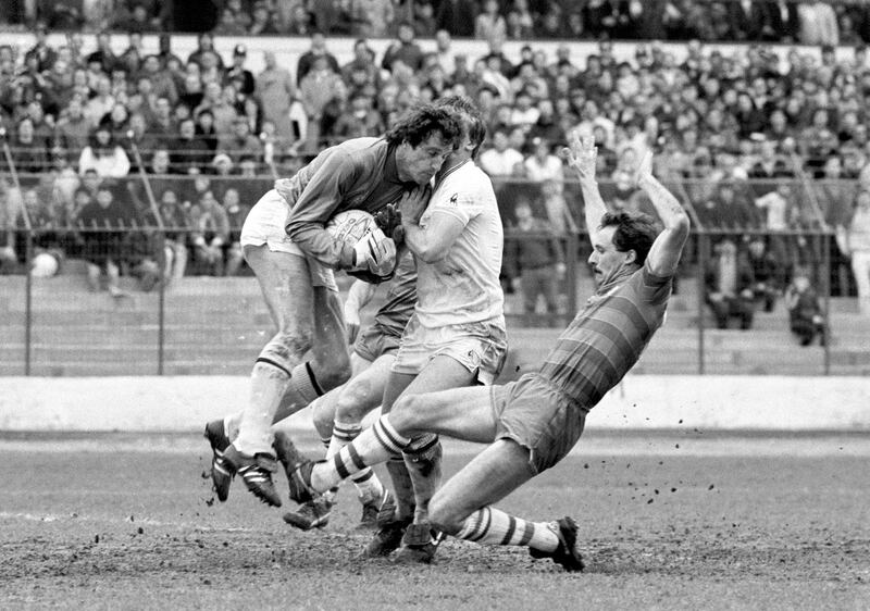 File photo dated 27-04-1985 - Tottenham Hotspur goalkeeper Ray Clemence gathers the ball under pressure from teammate Graham Roberts and Chelsea's Gordon Davies PA Photo