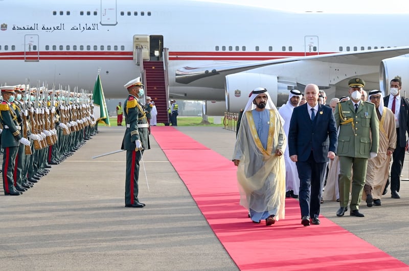 Sheikh Mohammed bin Rashid, UAE Vice President and Ruler of Dubai, is greeted by Algerian Prime Minister Aymen Benabderrahmane upon his arrival in Algiers for the summit. Photo: Dubai Media Office