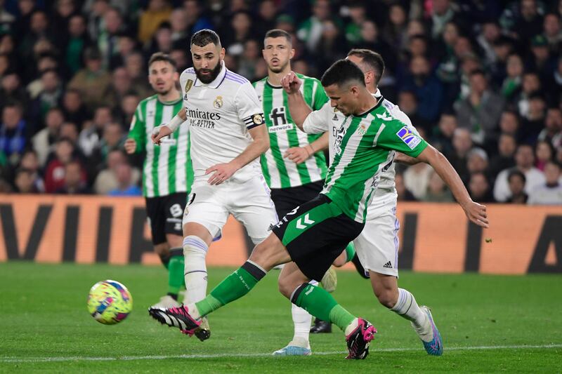 Real Betis defender Luiz Felipe vies with Real Madrid's Karim Benzema. AFP