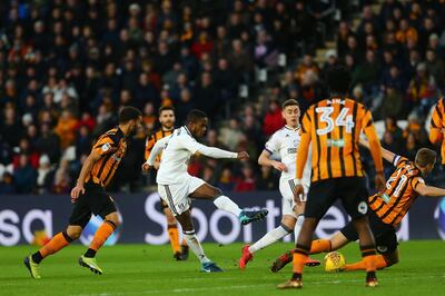 HULL, ENGLAND - DECEMBER 30: Fulham's Ryan Sessegnon has a shot on goal blocked by Hull City's captain Michael Dawson during the Sky Bet Championship match between Hull City and Fulham at KCOM Stadium on December 30, 2017 in Hull, England. (Photo by Ashley Allen/Getty Images)