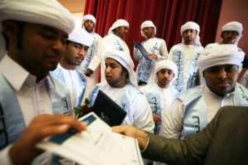 Abu Dhabi, Uniteda Arab Emirates _ 04 June 2009  After their graduation exercises on Thursday, June 4, 2009, graduates of the Vocational Education Development Centre, which takes Emiratis who have dropped out of school or have been in prison, are given their diplomas/certificates.  ( Delores Johnson / The National ) *** Local Caption ***  dj_Vocational Center_004.jpg