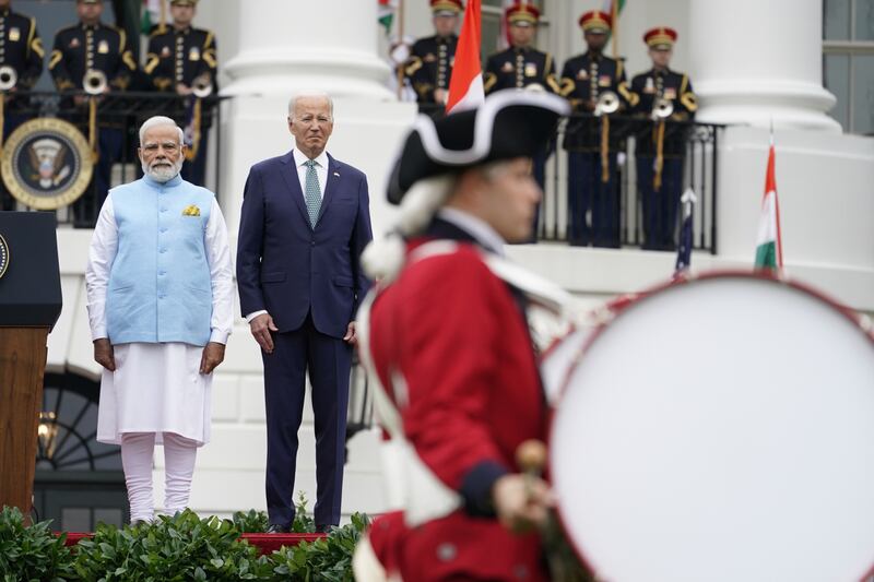 Mr Modi and Mr Biden watch a performance by the US Army Old Guard Fife and Drum Corps. AP