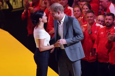 The Duke and Duchess of Sussex appear on stage together. Getty Images