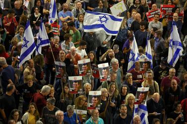 People attend a protest against Israeli Prime Minister Benjamin Netanyahu's government and to call for the release of hostages kidnapped in the deadly October 7 attack on Israel by the Palestinian Islamist group Hamas from Gaza, in Tel Aviv, Israel, April 20, 2024.  REUTERS / Hannah McKay