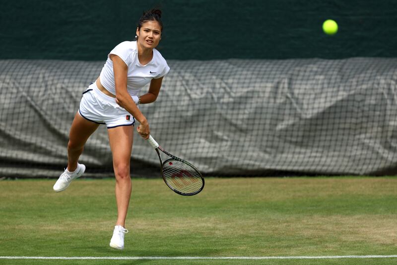 Emma Raducanu serves during training. Getty