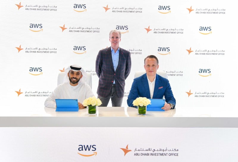 Abdulla Al Shamsi, acting director general of the Abu Dhabi Investment Office, and Wojciech Bajda, head for the public sector in the Middle East and Africa at Amazon Web Services, right, at the signing ceremony. Photo: Adio