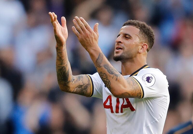 FILE - In this Sunday, Oct. 2, 2016 file photo, Tottenham Hotspur's Kyle Walker blows a kiss to the fans after the end of their Premier League soccer match against Manchester City at White Hart Lane stadium in London. Kyle Walker became the most expensive defender of all time when he joined Manchester City from Tottenham, the playerâ€™s management company said Friday, July 14, 2017. Based on Base Soccer Agencyâ€™s disclosure, the undisclosed transfer fee would eclipse the 50 million pounds (then $84 million) that Paris Saint-Germain paid Chelsea for David Luiz in 2014. (AP Photo/Frank Augstein, file)