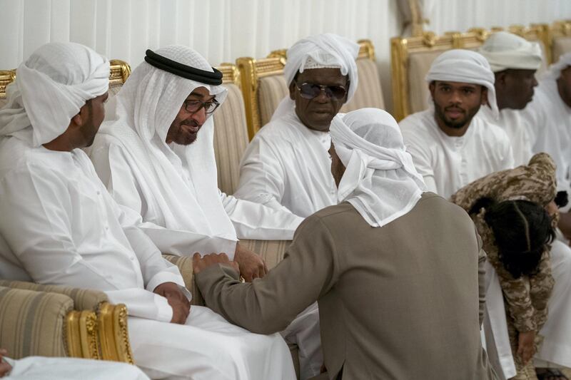 FUJAIRAH, UNITED ARAB EMIRATES - February 21, 2018: HH Sheikh Mohamed bin Zayed Al Nahyan, Crown Prince of Abu Dhabi and Deputy Supreme Commander of the UAE Armed Forces (2nd L) offers condolences to the family of the martyr Ali Khalifa Hashel Al Mesmari, who passed away while serving the UAE Armed Forces in Yemen.
( Mohamed Al Hammadi / Crown Prince Court - Abu Dhabi )
---