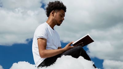OpenAI's Sora was able to create a video based on the prompt, 'A young man at his 20s is sitting on a piece of cloud in the sky, reading a book.'