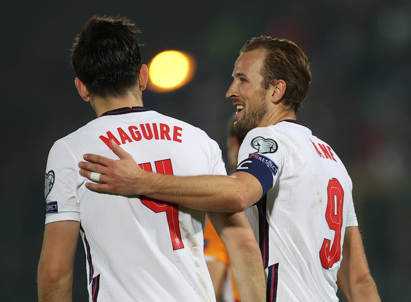 England's Harry Kane celebrates scoring their fifth goal with Harry Maguire. Reuters