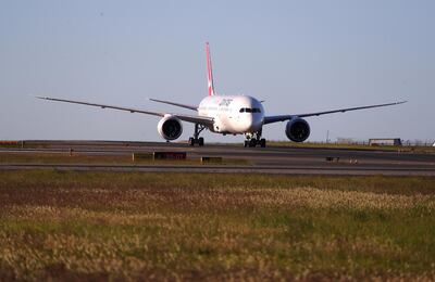 The Qantas Boeing 787 Dreamliner plane arrives at Sydney International Airport after flying direct from New York on Sunday, October 20, 2019 in Australia. Qantas will operate the flights later this year, with medical scientists and health experts on board to conduct studies in the cockpit and the cabin to help determine strategies to promote long haul inflight health and wellbeing on ultra-long haul flights. It will be the first commercial airline to ever fly direct from New York to Sydney. It comes as the national carrier continues to work towards the final frontier of global aviation by launching non-stop commercial flights between the US and the UK to the east coast of Australia in an ambitious project dubbed "Project Sunrise".   David Gray /Getty Images for Qantas