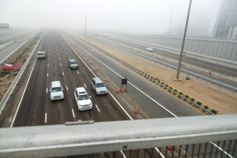 Abu Dhabi, U.A.E., January 16, 2018.  Early morning fog at the Khalifa-Masdar bridge area.
Victor Besa / The National
National