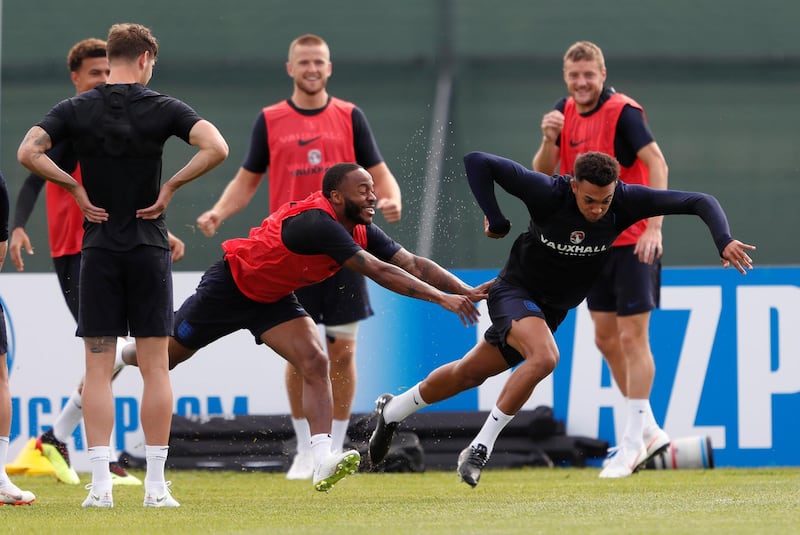 England's Raheem Sterling, Trent Alexander-Arnold and team mates during training REUTERS / Lee Smith