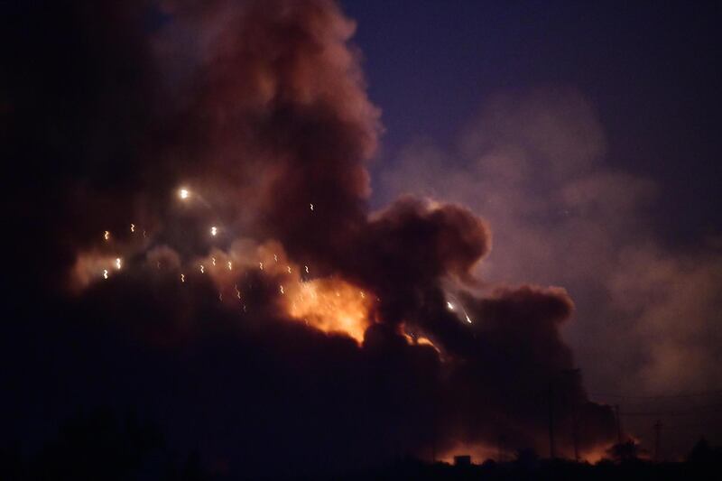 A view of the explosion of a weapon stash belonging to the Sayid al-Shuhadaa combat division part of al-Hashd al-Shaabi (Popular Mobilization Forces), near Baghdad, Iraq.  EPA
