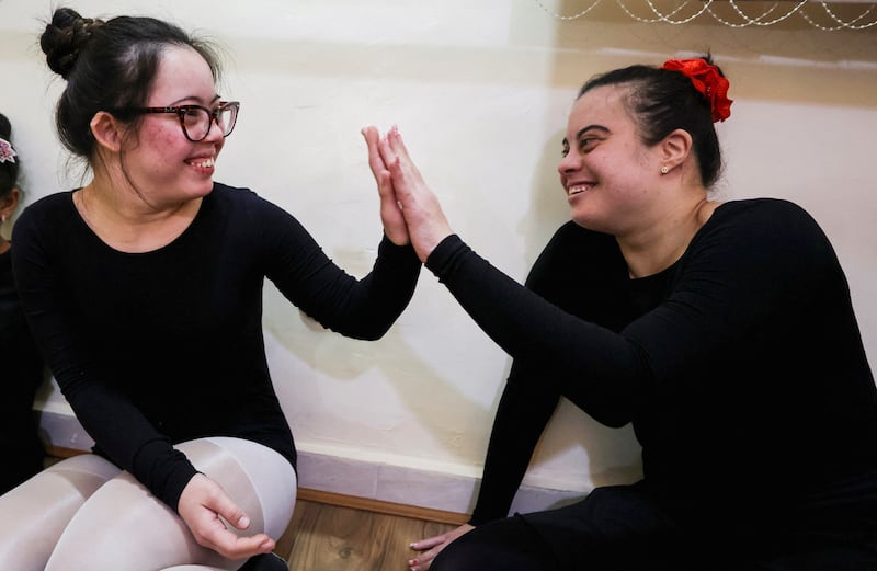 Hania Hany and Dina Tarek at an inclusive ballet studio for ballerinas with disabilities, to integrate them with girls in collective training to become ballerinas in Alexandria, Egypt, on March 8. Reuters