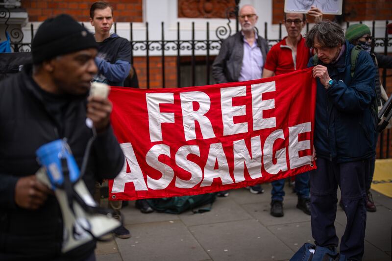 Protesters demonstrate outside the Ecuadorian embassy in London on the fifth anniversary of WikiLeaks founder Julian Assange's incarceration in Belmarsh Prison. Getty Images