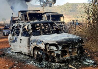 The charred remains of more than 30 people, including women and children, were found in burnt-out vehicles in Myanmar on Saturday. Photo: AP