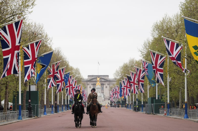 Mounted police officers patrol ahead of the coronation of King Charles III, with parts of London cordoned off. Reuters
