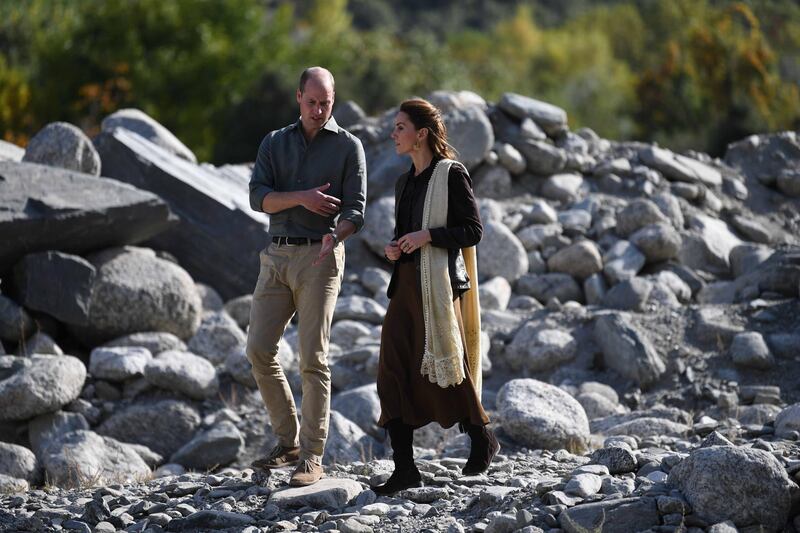 Britain's William (L) and Catherine (R), Duke and Duchess of Cambridge visit flood ruins in the village of Bumburet in the Chitral District of Khyber-Pakhunkwa Province in Pakistan.  EPA